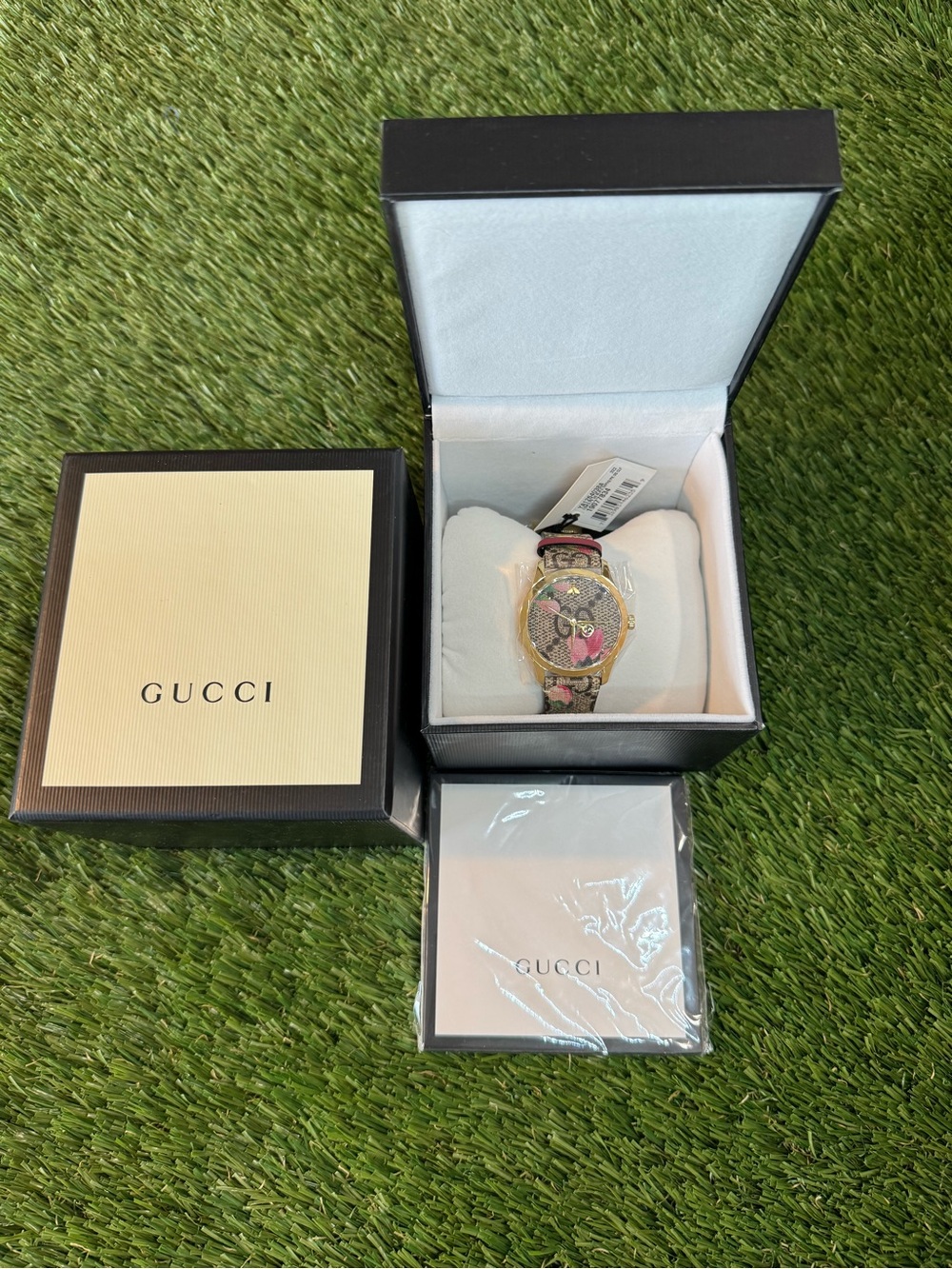 Gucci Gold-Tone Watch with Pink Floral Dial and Matching Strap